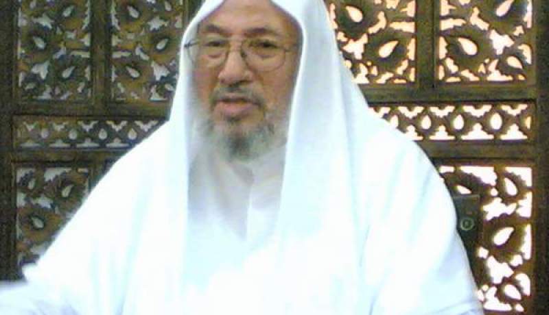 الشيخ القرضاوي يهدر دم معمر القذافي