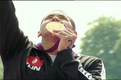 التونسي اسامة الملولى يحرز الميدالية الذهبية في ماراطون السباحة