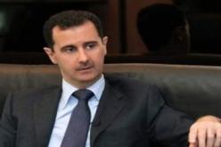 التلفزيون السوري يبث لقطات للرئيس الأسد مستقبلا وزير الدفاع الجديد