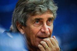 مدرب مانشستر سيتي يتهم لاعبيه بالتراخي أمام ويغان