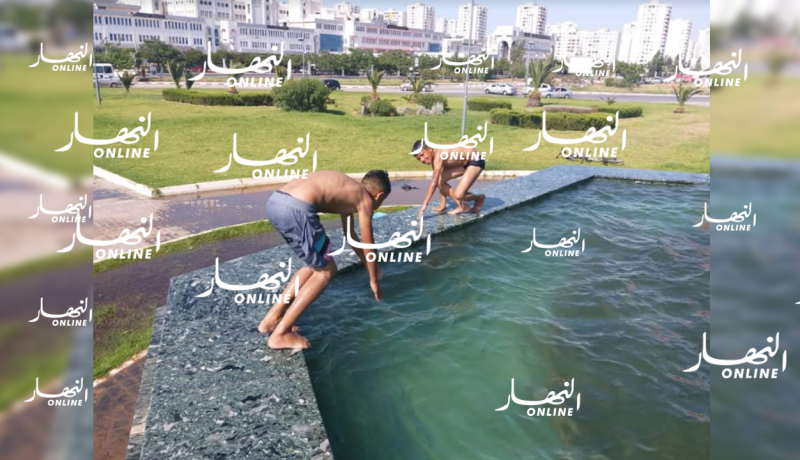 بالصور..نافورة تتحول إلى مسبح بوهران