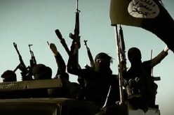 بالصور داعش يعدم 13 عراقياً