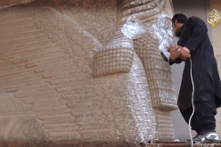 بالفيديو تنظيم الدولة الاسلامية ينشر شريطا مصورا لتدمير آثار في الموصل