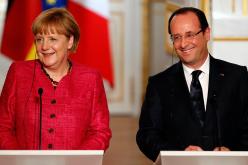 هولاند وميركل يدعوان إلى تخفيف حدة التوتر بين موسكو وأنقرة