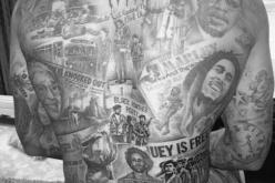 “غراي” يحتفل بتاريخ السود بوشم “محمد علي” و “بوب مارلي”   