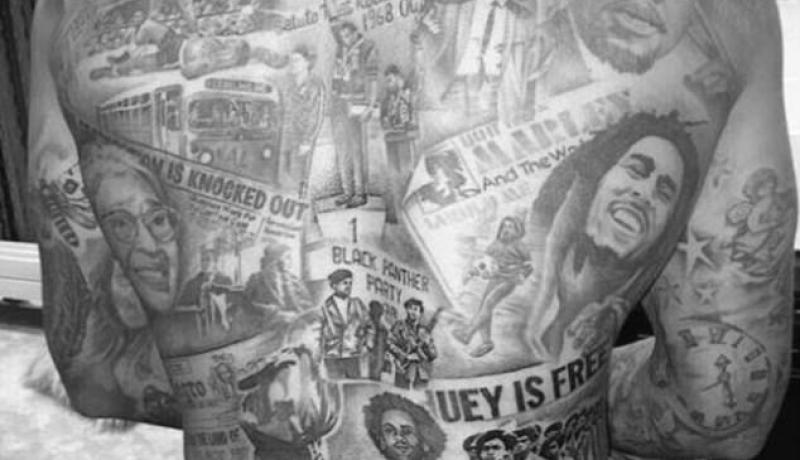 “غراي” يحتفل بتاريخ السود بوشم “محمد علي” و “بوب مارلي”   