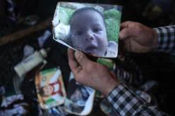 اعتقال مشتبهين لصلتهم بالحريق الذي قتل فيه طفل فلسطيني