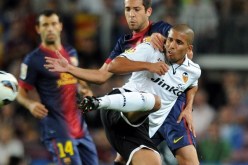 شاهد ما فعله فيغولي بميسي والأخير يرد عليه