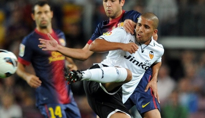 شاهد ما فعله فيغولي بميسي والأخير يرد عليه