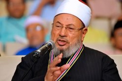 القرضاوي يطلب من مهنئيه الدعاء على السيسي وبشارالأسد