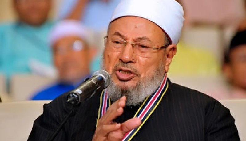 القرضاوي يطلب من مهنئيه الدعاء على السيسي وبشارالأسد