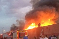 الدفاع المدنى العراقى ينقذ 100 طالب جامعى ويخمد حريقا وسط بغداد