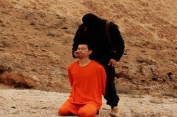 داعش يعلن إعدامه رهينتين نرويجي وصيني