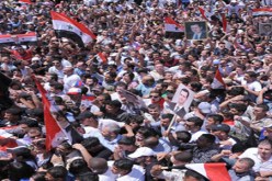 انصار الاسد بحتشدون بالمئات للتعبير عن عرفانهم تجاه موسكو وبكين