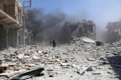 مقتل وإصابة 33 شخصا في غارات وقصف على عدة أحياء بمدينة حلب السورية