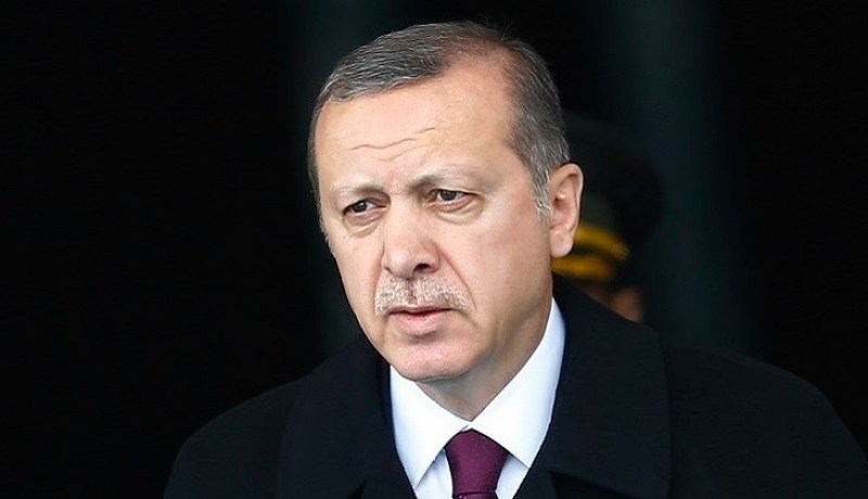 أردوغان يرفع دعوى ضد صحيفة اتهمته بتسليم أسلحة لمسلحين بسوريا