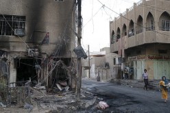 مقتل 9 في هجوم انتحاري وتفجيرين في بغداد ومحيطها