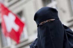 سويسرا تشرع في تطبيق قانون منع ارتداء النقاب