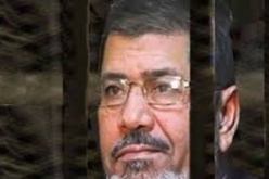 مرسي يصل إلى مقر المحكمة بأكاديمية الشرطة