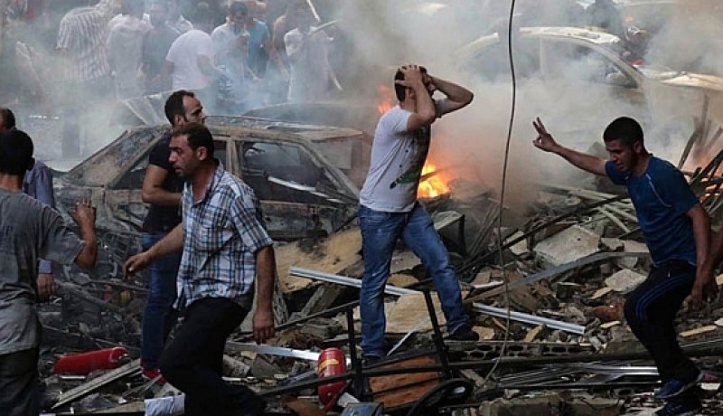 إرتفاع ضحايا التفجيرين في حمص السورية إلى 22 قتيلا