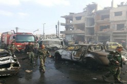 ارتفاع حصيلة ضحايا التفجيرات الإنتحارية بحمص السورية إلى 42 قتيلا