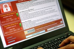 بوتين يتهم الاستخبارات الأمريكية بالوقوف وراء الهجوم الإلكتروني