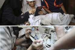 صورة اليوم: طفل فلسطيني يشاهد صورته أثناء انتشاله من تحت الانقاذ