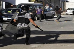 أعمال شغب بعمان وإصابة ثلاثة من رجال الأمن