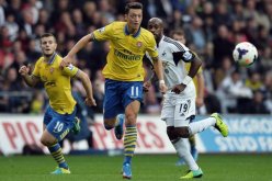 أرسنال يتصدر البريمير ليغ بثنائية في شباك سوانزي سيتي