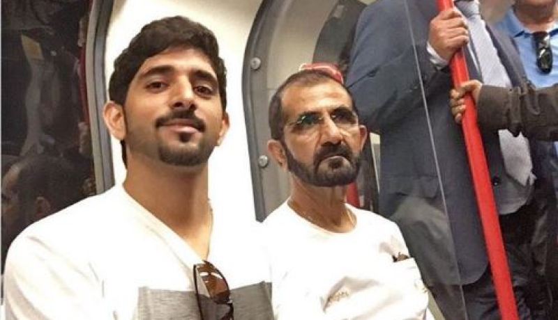 بالفيديو حاكم دبي ونجله في مترو لندن وسط الركاب