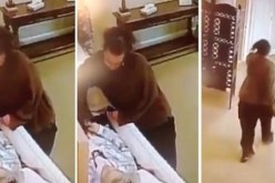 بالفيديو.. إمرأة تسرق خاتما من جثة
