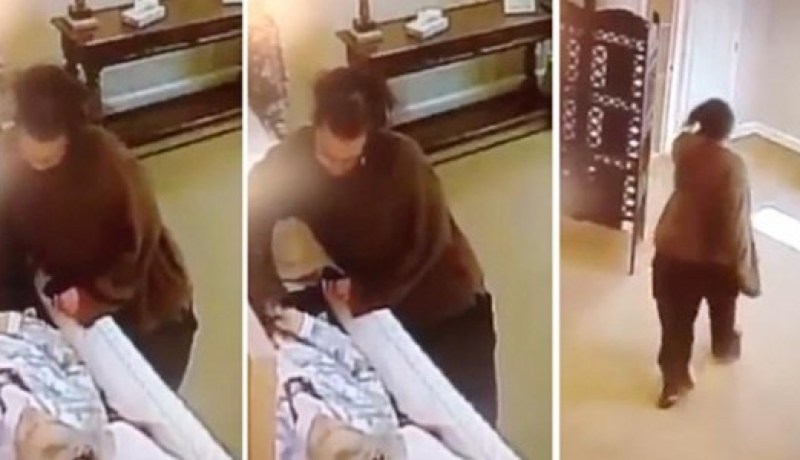 بالفيديو.. إمرأة تسرق خاتما من جثة