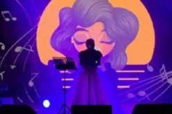 شاهد.. فنانة منقبة تتفوق على أشهر الفنانين دون أن يرى أحد وجهها!