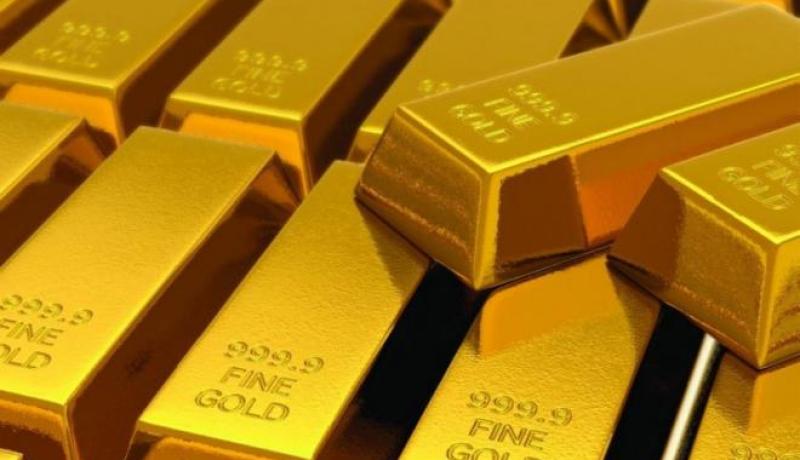 الذهب يتراجع مع ارتفاع الدولار والأنظار على بيانات الوظائف الأمريكية