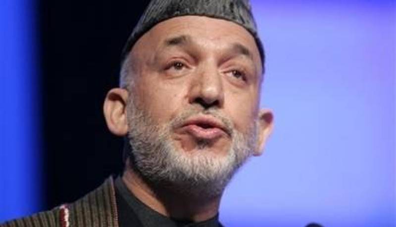 كرزاي يدعو الملا عمر للترشح للانتخابات الرئاسية في أفغانستان والتخلي عن السلاح