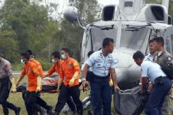 إيفاد رجال دين إلى موقع تحطم طائرة إير اسيا للصلاة من أجل ضحايا الطائرة المنكوبة