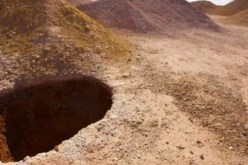 بالصور حفرة مخيفة تخبأ قرية سياحية مذهلة