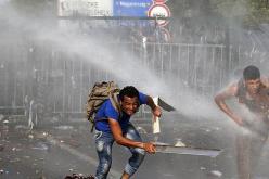 اشتباكات بين اللاجئين والشرطة في حدود المجر مع  صربيا