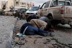 ء4 قتلى و 40 جريحا في اشتباكات مسلحة بين عناصر كتيبة  و متظاهرين