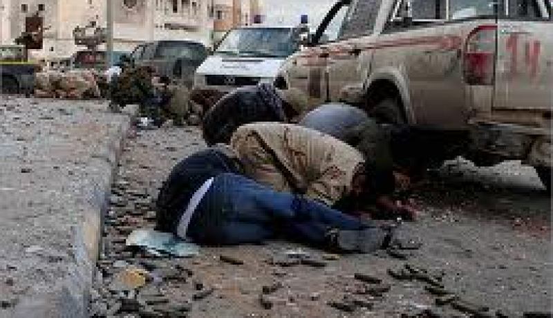 ء4 قتلى و 40 جريحا في اشتباكات مسلحة بين عناصر كتيبة  و متظاهرين