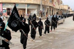 داعش يشعل النيران في ثلاثة آبار نفطية شرقي تكريت بالعراق