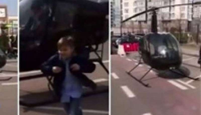 بالصورة..طفل يذهب إلى المدرسة بالهيليكوبتر لتأخره عن الدرس
