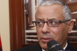 زيدان يطالب دول الجوار بتسليم أعوان القذافي