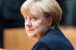 ميركل ترفض خفض ديون اليونان