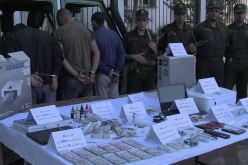 شرطي ضمن عصابة مختصة في المتاجرة بالكوكايين وتزوير النقود