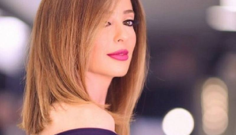 بالصور..وفاء الكيلاني تكشف لأول مرة صورة ولديها