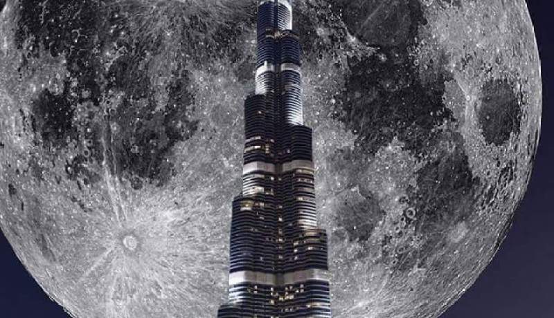 بالفيديو..  القمر العملاق من على برج خليفة مشهد لا يتكرر