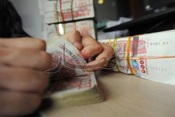 التحقيق في تعاملات تجارية وهمية لتجار مع شركة للمشروبات الغازية