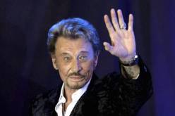  الإليزيه يؤكد حضور ماكرون وزوجته جنازة هاليداي