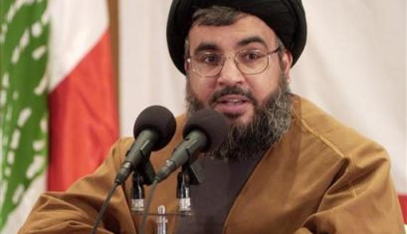 نصر الله يفوز على القذافي